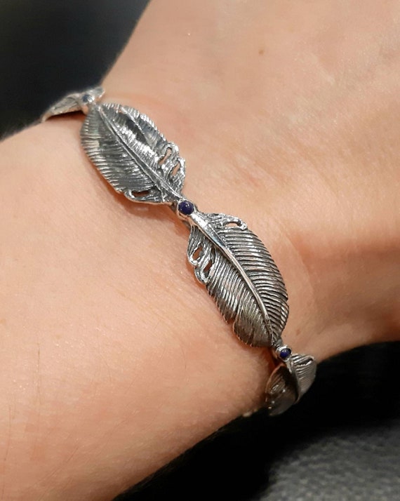 Montana Silversmiths Women's Strength Within Feather Cuff Bracelet - Silver  - Langstons