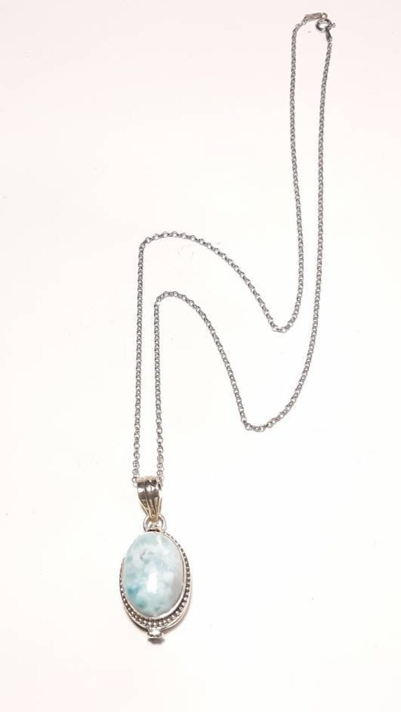 Poison locket hotsell necklace