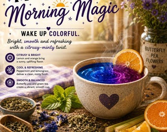 May include: A speckled ceramic mug filled with a vibrant blue and purple tea, garnished with an orange slice. The scene includes loose butterfly pea flowers, green tea leaves, mint sprigs, and lemongrass stalks, with text reading Monster Morning Magic.