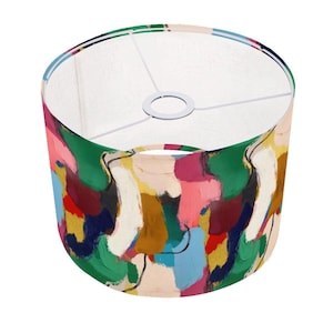 May include: A colorful lampshade with abstract brushstrokes in shades of green, red, pink, yellow, blue, and white.
