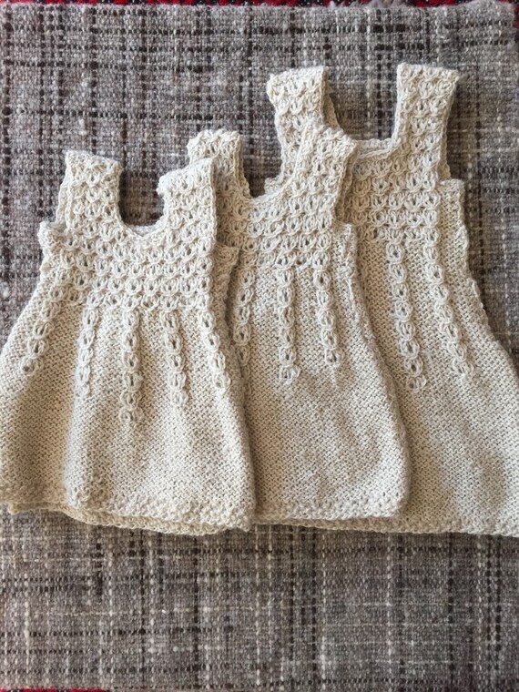 hand knitted baby dresses