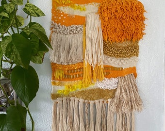 Yellow woven wall hanging. Yellow weaving. Yellow home decor.