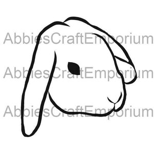 May include: Line drawing of a rabbit's head with one ear folded over the head. The rabbit is facing to the right.