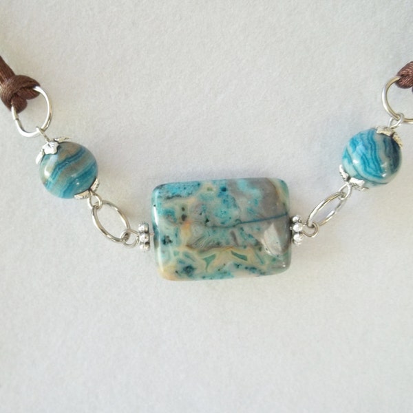 Blue agate and silver choker necklace.  Blue choker on brown cord. Blue and silver.  Simple necklace.  Agate jewelry.  Blue agate necklace.