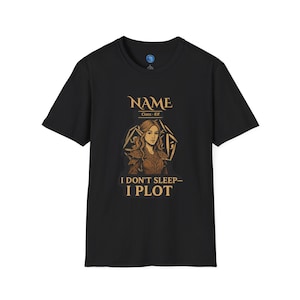 May include: Black t-shirt with a graphic of an elf woman and the text "NAME Class - Elf I DON'T SLEEP - I PLOT" in gold. The elf illustration is in a geometric frame.