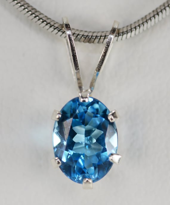 Swiss Blue Topaz Pendant~.925 Sterling Silver Setting~8mm x 6mm Oval Cut~Genuine Natural Mined