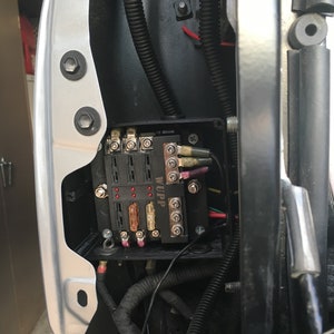 Toyota Tacoma taillight fuse block mount (2nd and 3rd gen: 2005+)