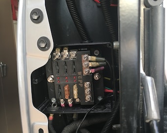 Toyota Tacoma taillight fuse block mount (2nd and 3rd gen: 2005+)
