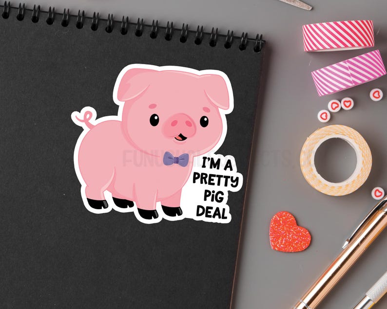 May include: A pink pig wearing a blue bow tie with the text "I'm a pretty pig deal" on a black background.