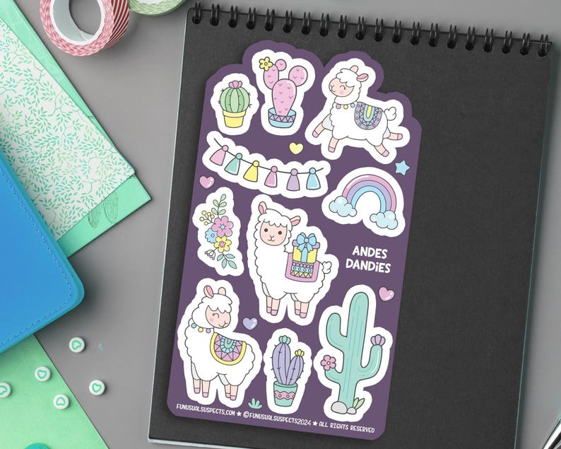 May include: A sheet of colorful stickers featuring cute llamas, cacti, rainbows, and hearts. The stickers are on a purple background and have the text "ANDES DANDIES" on them.