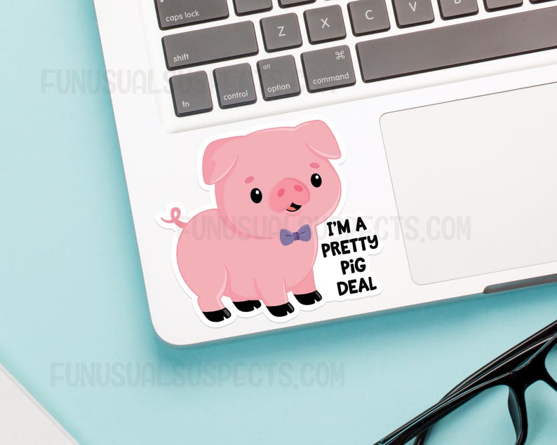 May include: A pink pig wearing a blue bow tie with the text "I'm a pretty pig deal" on a white laptop.