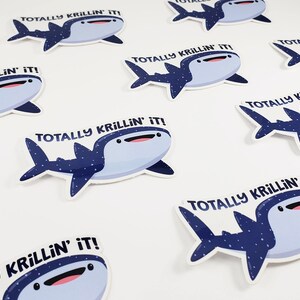 May include: A set of nine stickers featuring a cartoon whale shark with blue and white spots. Each sticker has the text "Totally Krillin' It!" printed on it.
