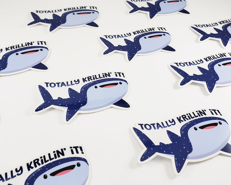 May include: A set of nine stickers featuring a cartoon whale shark with blue and white spots. Each sticker has the text "Totally Krillin' It!" printed on it.