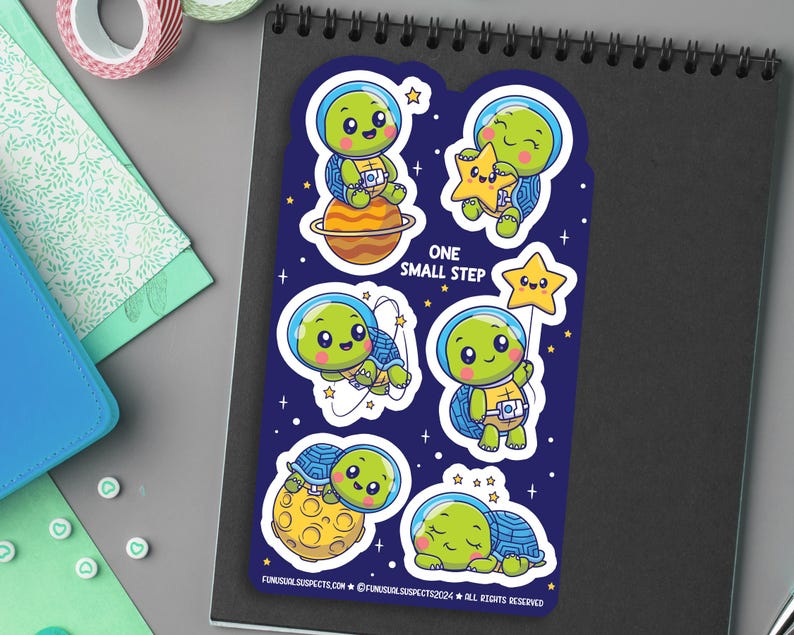 May include: A set of six stickers featuring cute cartoon turtles in space. The turtles are wearing astronaut helmets and are holding stars, planets, and other space-themed objects. The stickers are printed on high-quality vinyl and are perfect for decorating laptops, water bottles, notebooks, and more. The stickers say "One Small Step".