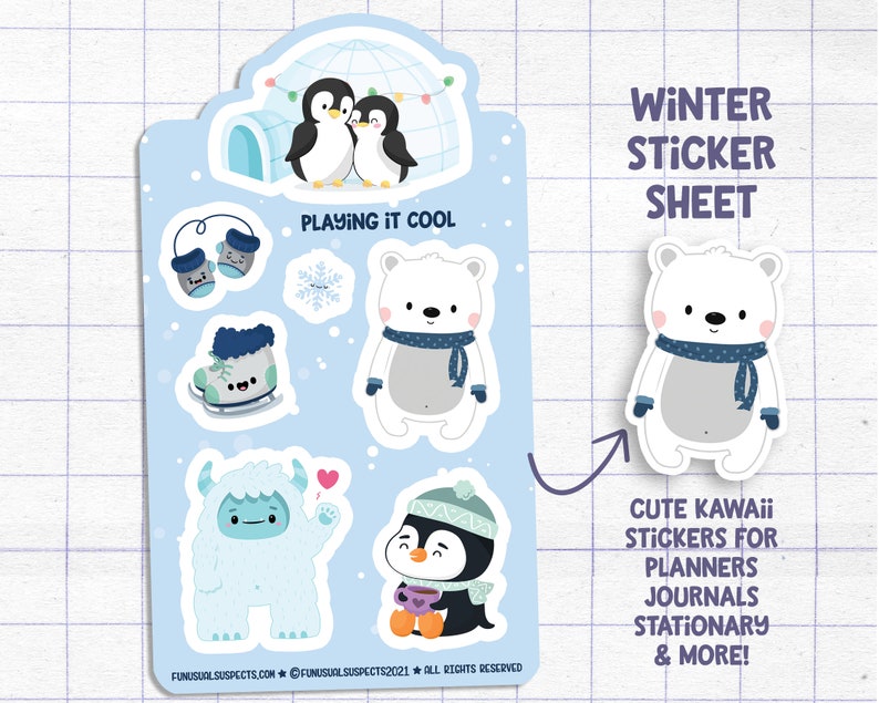 Puede incluir: Una hoja de pegatinas con tem&aacute;tica invernal con lindas ilustraciones kawaii de ping&uuml;inos, osos polares y un yeti. La hoja incluye el texto "Playing it Cool" y "Winter Sticker Sheet".