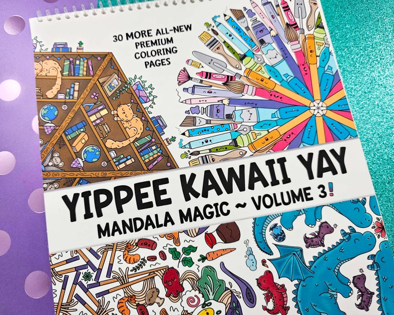 Puede incluir: Un libro para colorear blanco con una ilustraci&oacute;n colorida de materiales de arte en la portada. El t&iacute;tulo del libro es "Yippee Kawaii Yay Mandala Magic ~ Volume 3!"