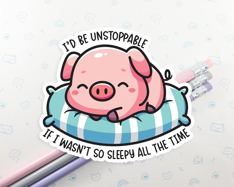 May include: A pink pig cartoon character with a big smile is sleeping on a blue and white striped pillow. The text reads "I'd be unstoppable if I wasn't so sleepy all the time."