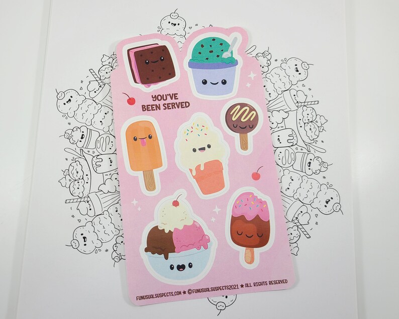 May include: A pink sticker sheet featuring various ice cream designs with smiling faces. The sheet includes an ice cream sandwich, ice cream in a cup, a popsicle, and an ice cream cone. The text "YOU'VE BEEN SERVED" is printed on the sheet.