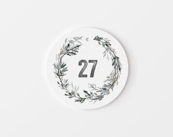 winter-themed number tags | charity pull event | pine wreath edition