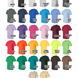 May include: A chart of 24 different colored t-shirts, each with a short-sleeve crew neck. The t-shirts are arranged in four rows of six, with each row representing a different color family. The colors include white, black, gray, blue, pink, red, green, yellow, brown, and orange.