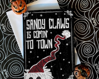 Sandy Claws is coming to town... - alternative dark gothic Christmas card, available as a single or in packs. Goth card. Nightmare Before