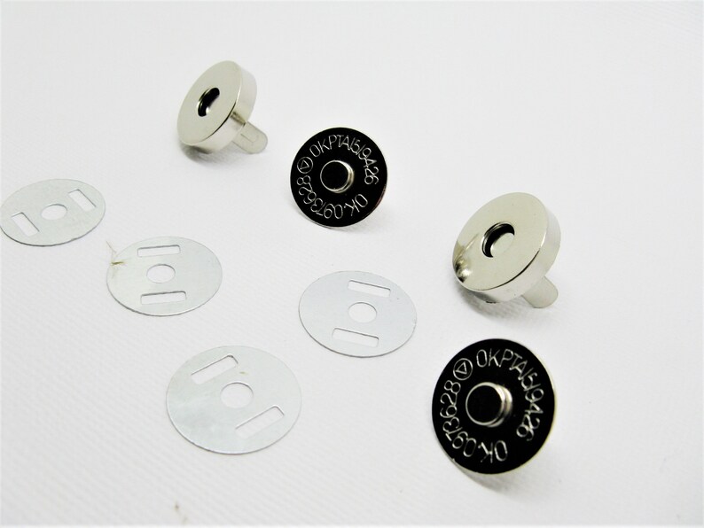 Lot of 2 magnetic clast buttons with bronze metal rivets