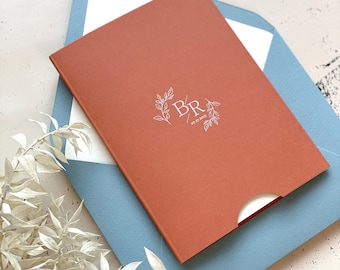 Slide up floral SAVE the date card with monogram