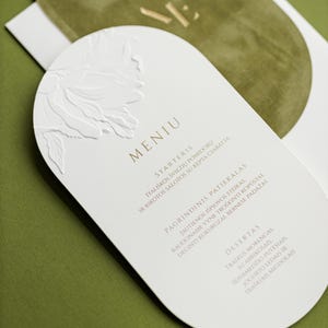 Luxurious Wedding Menu with Embossed Peony Design and Velvet Monogram