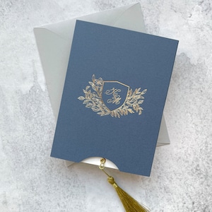Slide up floral invitation with gold foil monogram