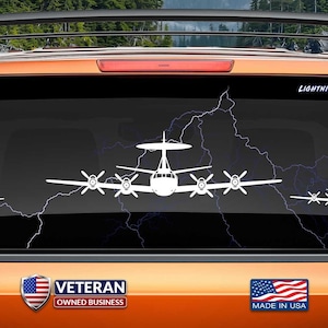 May include: White vinyl decal of a P-3 Orion aircraft on a car window. The decal is a popular gift and conversation starter. The decal is made in the USA and is safe for both indoor and outdoor use. The decal is designed and handmade to order. The decal is not endorsed by the manufacturer of the aircraft. The decal is sold by a veteran-owned business.