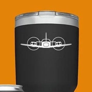 May include: Four stainless steel tumblers with a plane silhouette design. The tumblers are in different sizes and colors, including black, green, silver, and blue.