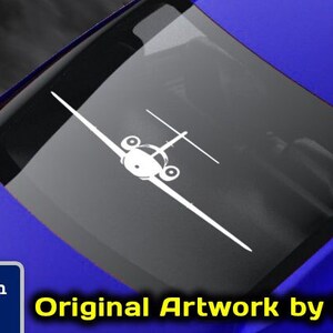 May include: A white silhouette of a private jet on a blue car with the text "www.fegraphics.com Flight Engineered Graphics Aircraft Decals Veteran Owned Business Original Artwork by NATE Every Decal is Hand Made to order by me, NATE."