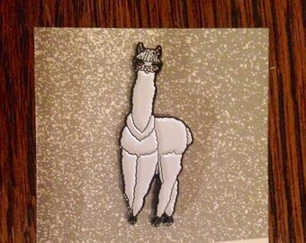 Alpaca Enamel Pins -Alpaca in her natural splendor and in her wintery wardrobe. Great stocking stuffer.