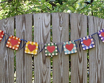 CSherwoodLeather Keepsake Hand painted Rainbow Love Lives Here Pride Banner with hand stitched hearts.