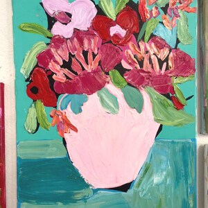 May include: An oil painting on canvas featuring a bouquet of thick, textured flowers in shades of red, pink, and orange. The flowers are arranged in a light pink vase against a vibrant turquoise background with visible, heavy brushstrokes.