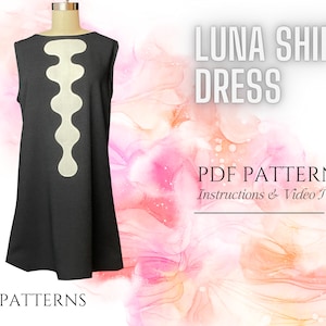Puede incluir: Un vestido negro sin mangas de estilo camisero con un diseño abstracto blanco en la parte delantera. El vestido está en un maniquí y el fondo es un diseño de acuarela rosa y naranja. El texto "LUNA SHIFT DRESS PDF PATTERN Instructions & Video Tutorial" está en blanco sobre fondo negro.