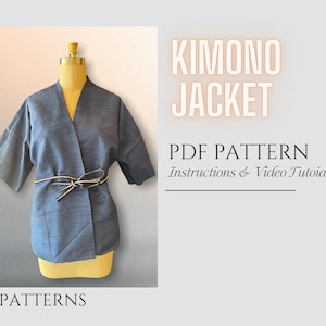May include: A blue kimono jacket sewing pattern with instructions and a video tutorial. The pattern is for a short-sleeved jacket with a tie belt.