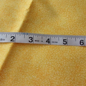 May include: A white measuring tape with black markings, showing numbers 1 through 8. The tape reads "60 in" and "Made in China".