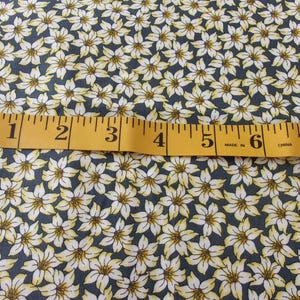 White and Yellow Flowers on Black from Timeless Treasures of SoHo 1 Yard