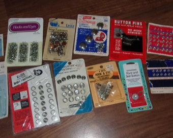 One Lot of Snaps and Fasteners 12 Packages Dritz Penn J & P Coats Clinton Scovill Prims and Others Mostly Unopened Packages