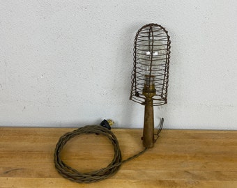 British Vintage industrial cage and wooden handle trouble light