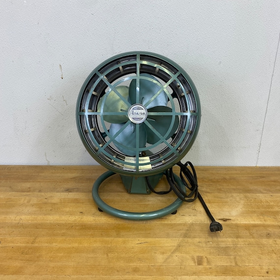 Vintage industrial machine age Arwin electric desk fan and heater