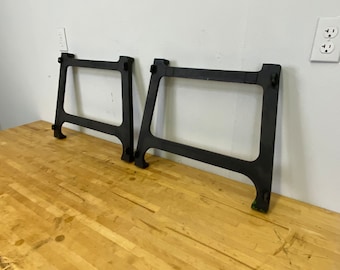 Pair of Vintage cast iron black colored machine legs 18” high 22” wide