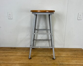 Vintage industrial angle steel stool co 26 1/2” angle steel stool with hardwood seat