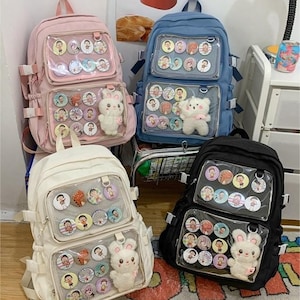 The Showcase 3.0 Ita Bag, Pin Display Bag, Clear Pocket Display Backpack,  Pin Trading Bag, Window Backpack, Pin Display Laptop Backpack 