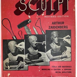 May include: A vintage book cover with the title "SCULPT" in white letters on a red background. The cover features images of sculpting tools and a bust being sculpted. Text includes "ANYONE CAN", "REVISED EDITION", and "ARTHUR ZAIDENBERG".