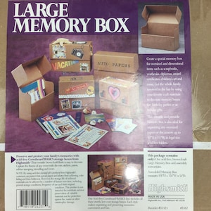May include: A brown kraft Large Memory Box with the text "LARGE MEMORY BOX." The box is designed for storing oversized items like scrapbooks and documents. The box measures 10"H x 15"W x 5"D.
