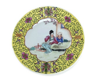 Chinese Decorative Plate Geisha Girl with Instructor Embossed Yellow Pink Green World Famous Chintehchen Porcelain Peoples Republic of China