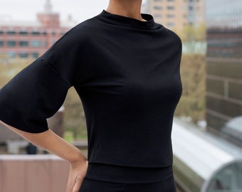 Hera wide funnel neck and dropped shoulder wide sleeve fitted top