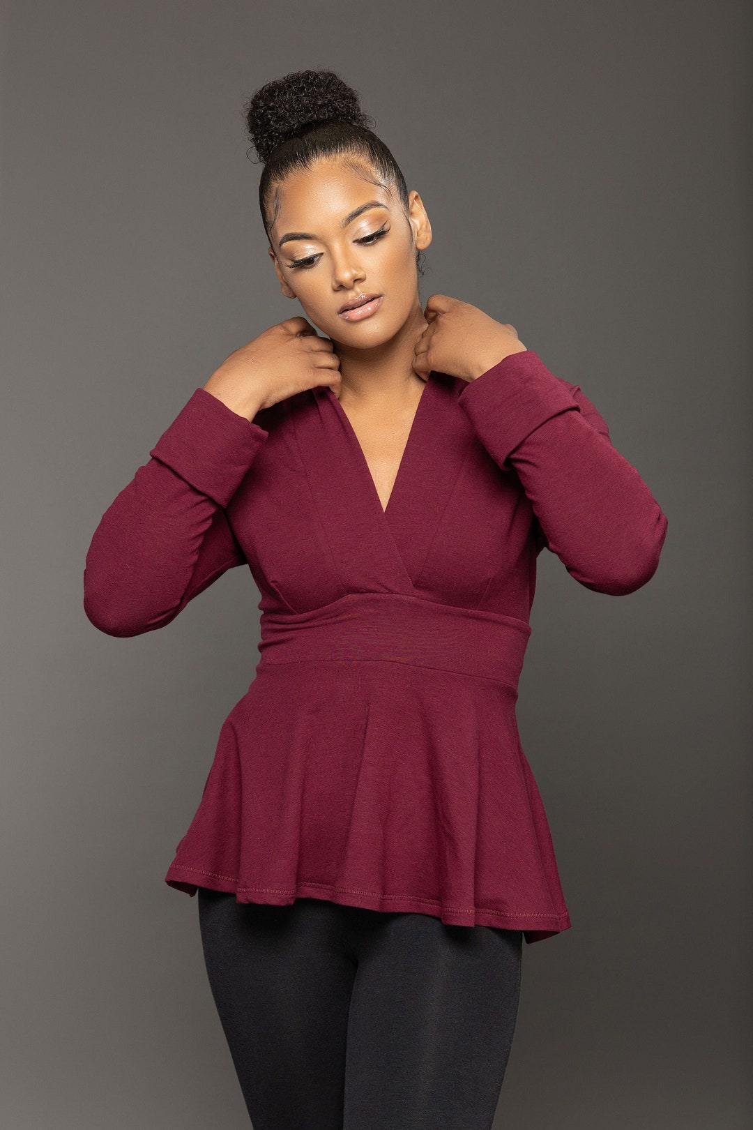 Deep V-neckline Long-Sleeved Peplum Tops